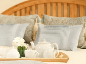 breakfast tray on bed
